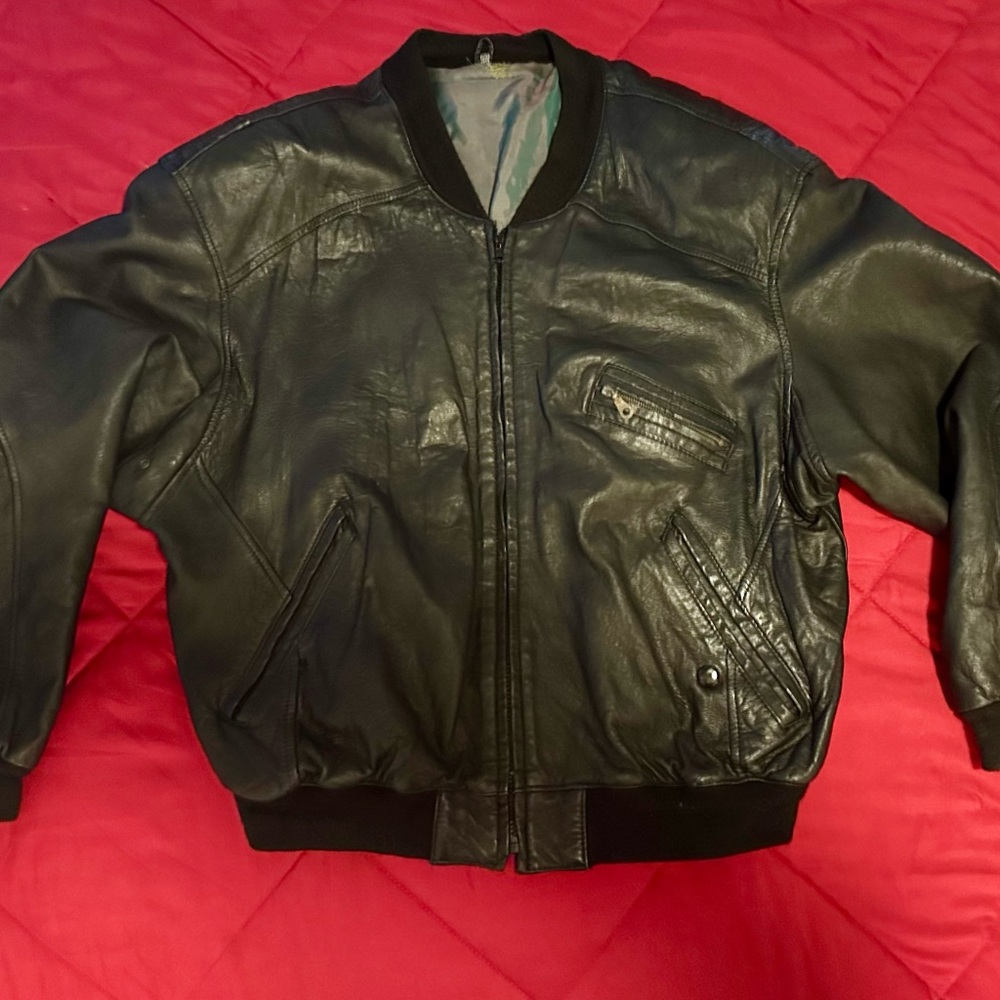 Black Bomber Jacket with Ribbed Cuffs and Distressed Leather